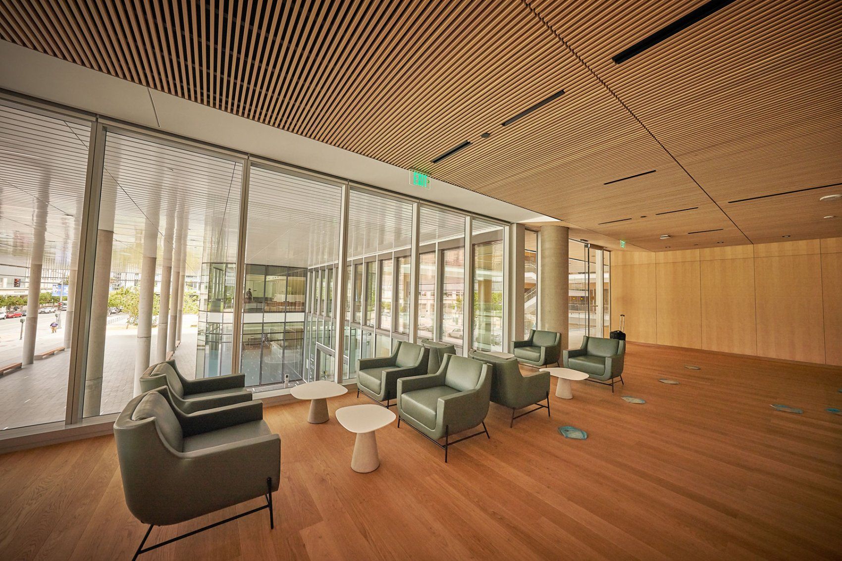 Green chairs in a lounge at the Weill Neurosciences Building