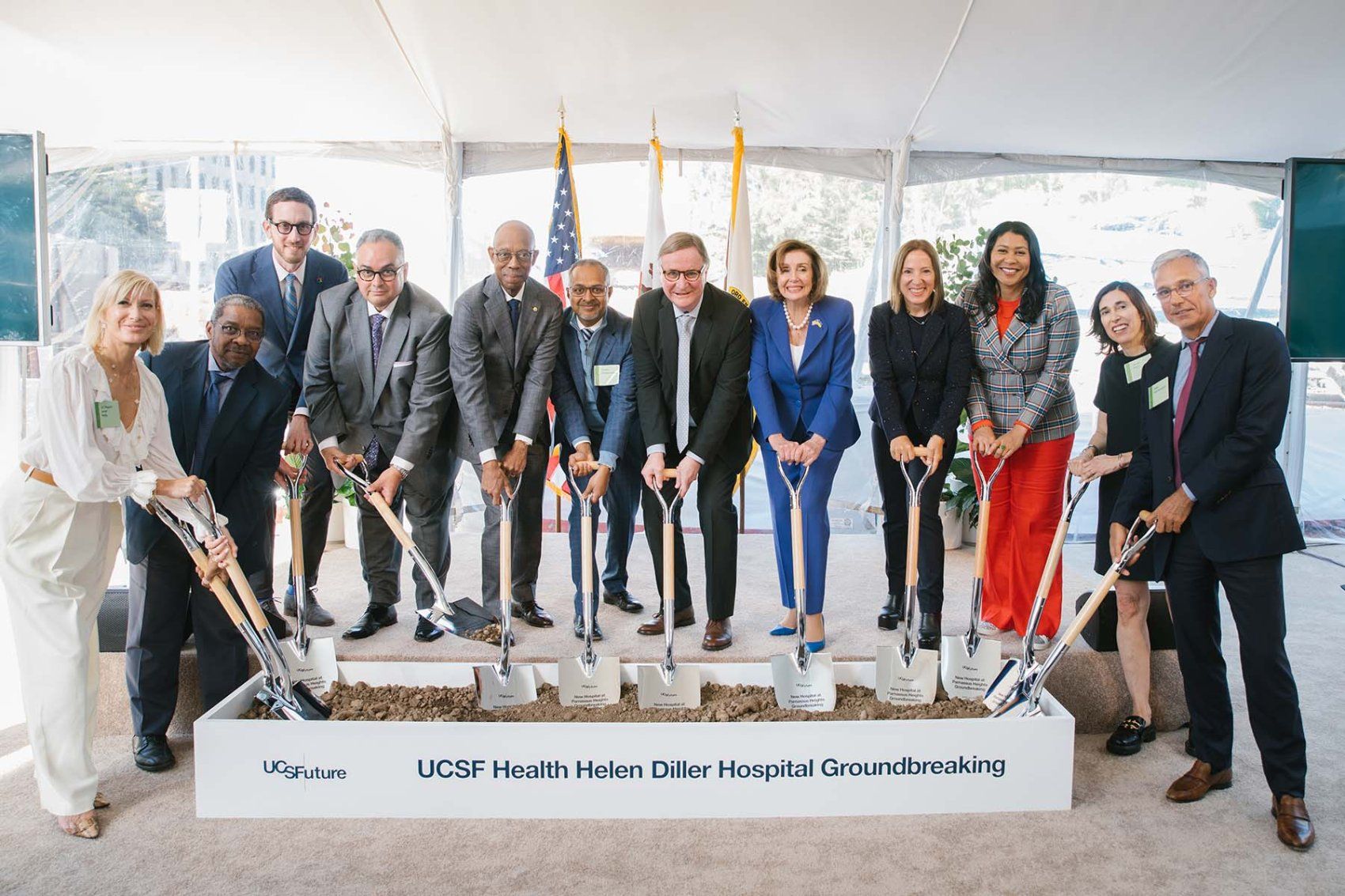 Leaders gather with shovels to break ground on the new hospital.