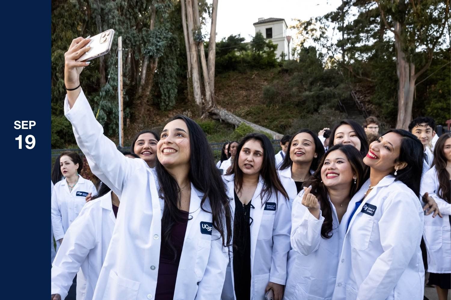 Group of people taking a selfie.