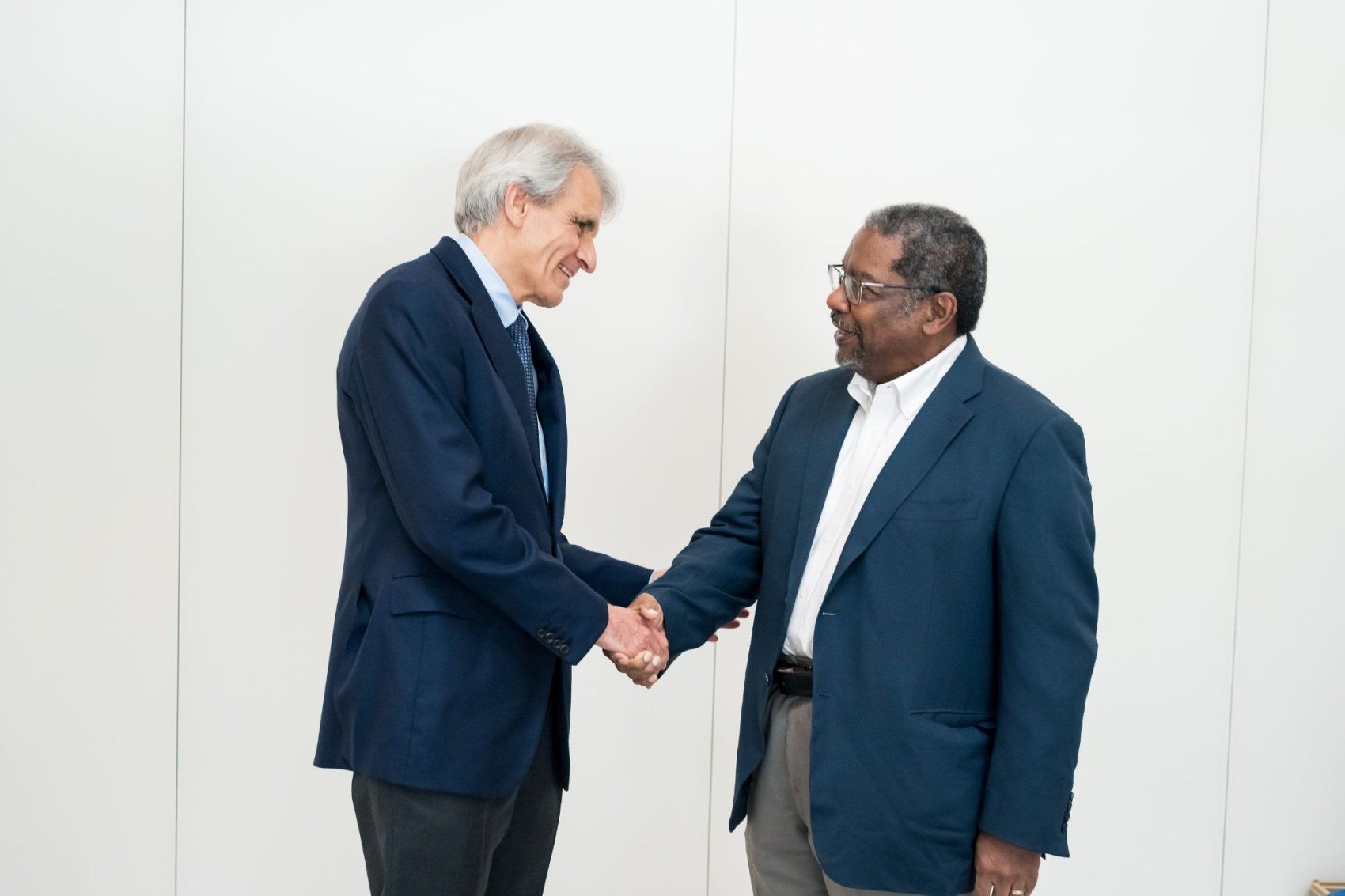 Talmadge shakes a colleague's hand.