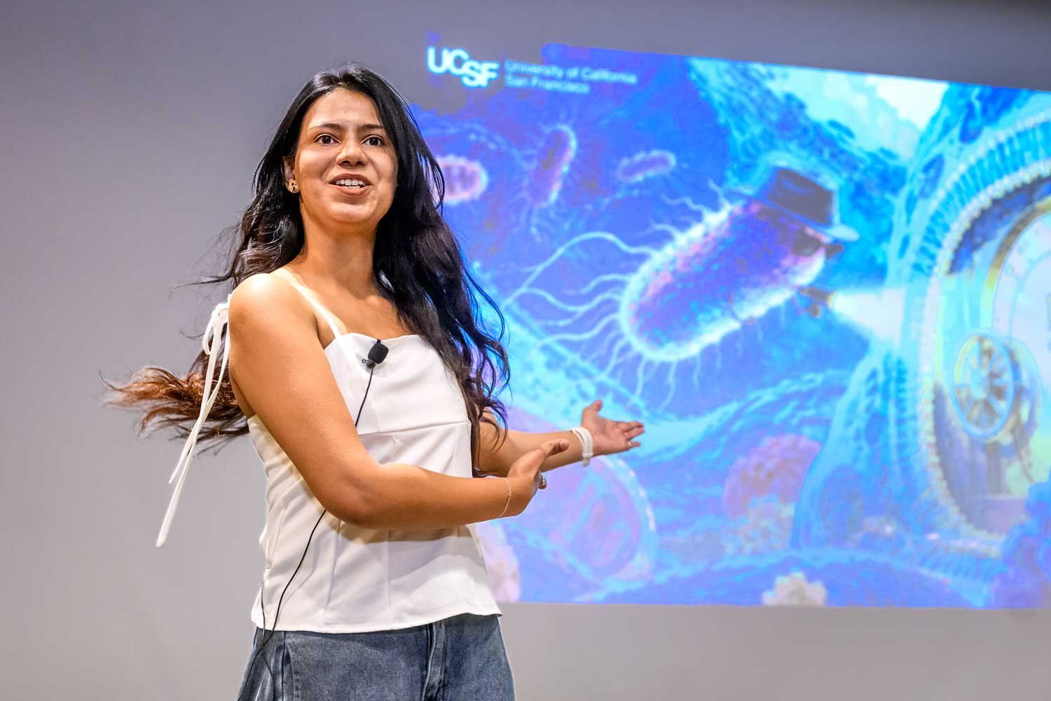 Third-place winner Puspangana Singh delivers her talk on stage.