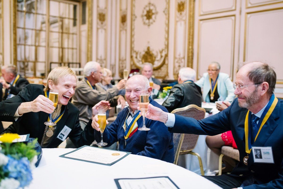 UCSF School of Dentistry alumni toast one another during a celebration to mark the 50th anniversary of the class of 1967’s commencement