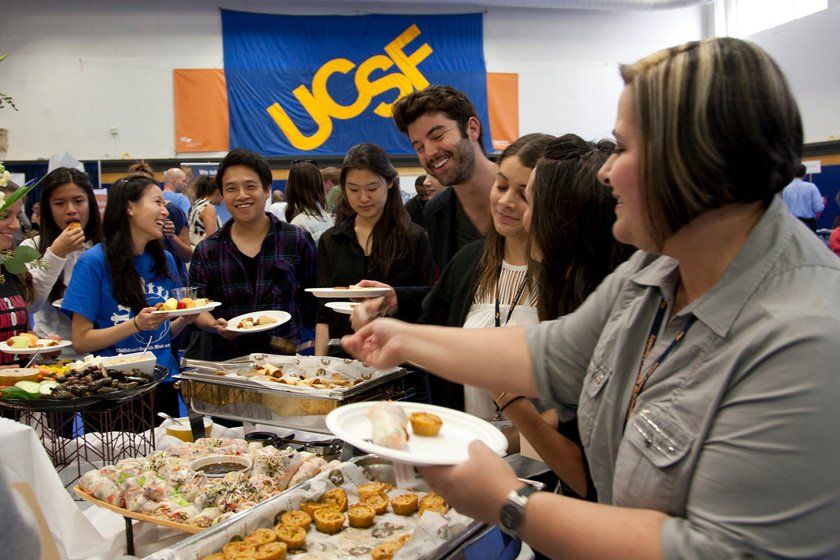 Students gather for free food and drinks at the Chancellor's Reception