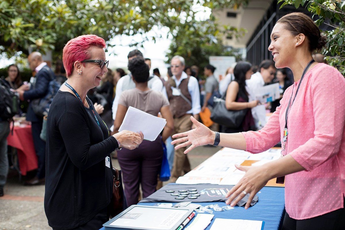 Associate dean for Education & Student Affairs for the School of Dentistry, talks with Alece Alderson, director of Student Success