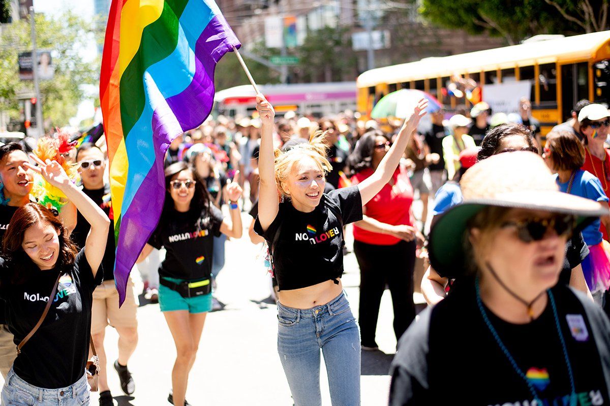 student dances during the San Francisco LGBT Pride Parade