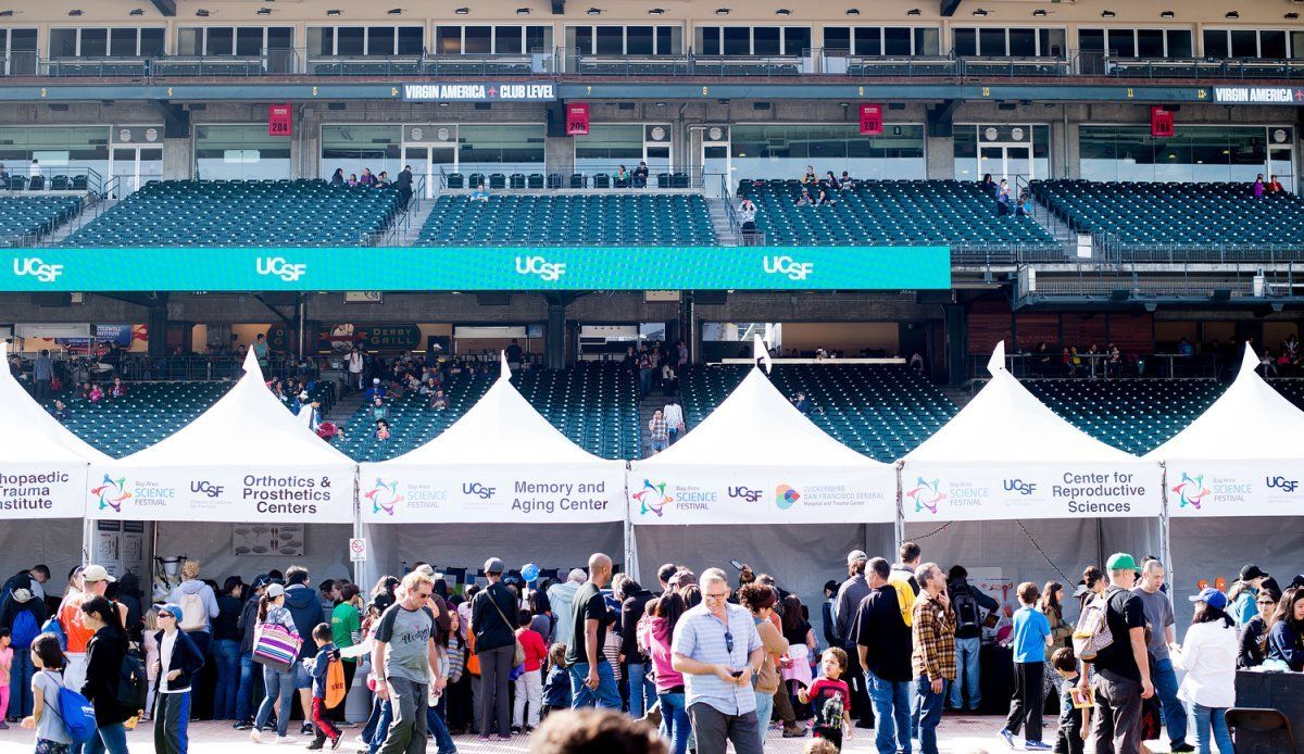 Big croud in front of UCSF booths at AT&T Park