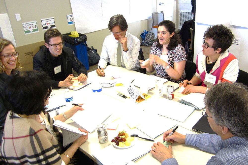 School of Medicine faculty and staff at a table