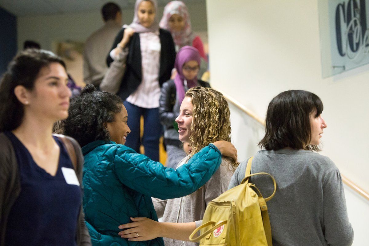 two students great each other