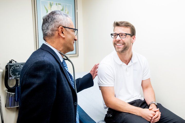 doctor talks with a patient