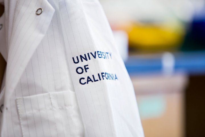 Lab coat with "University of California" on sleeve