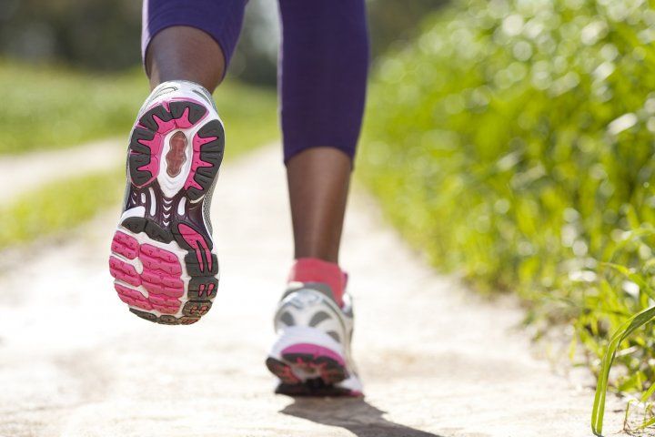 closeup of woman's shoes while she is running