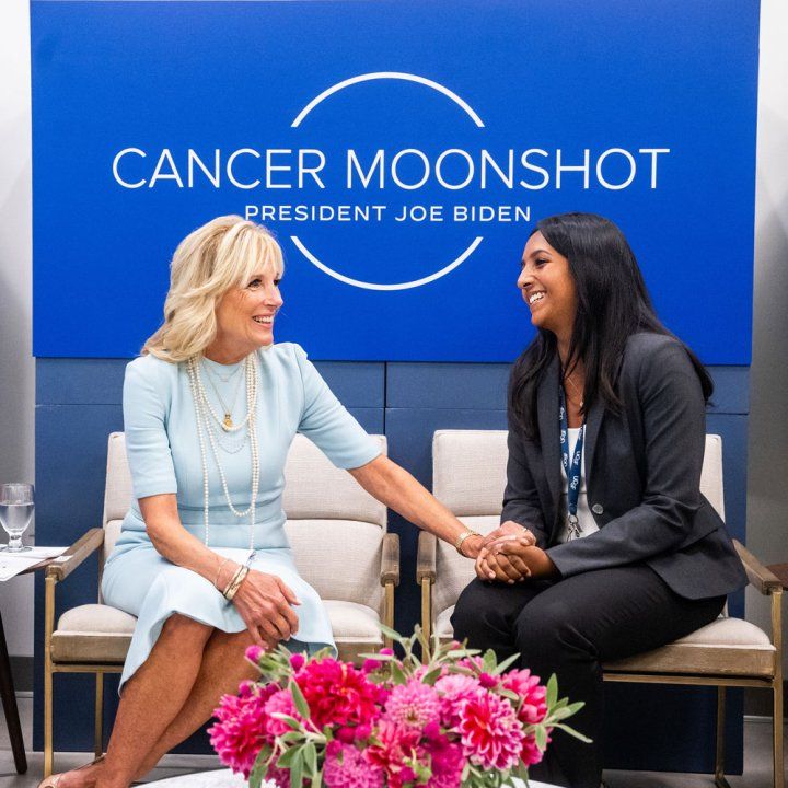 First Lady, Dr. Jill Biden (left) smiles along with Kami Pullakhandrum (right)