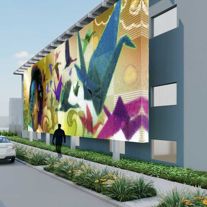 A computer rendering of a mural featuring an origami swan is on a clinc's exterior wall.