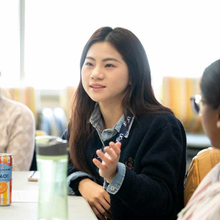 Tiffany Wang speaks during a class for the Doctor of Nursing Practice program.