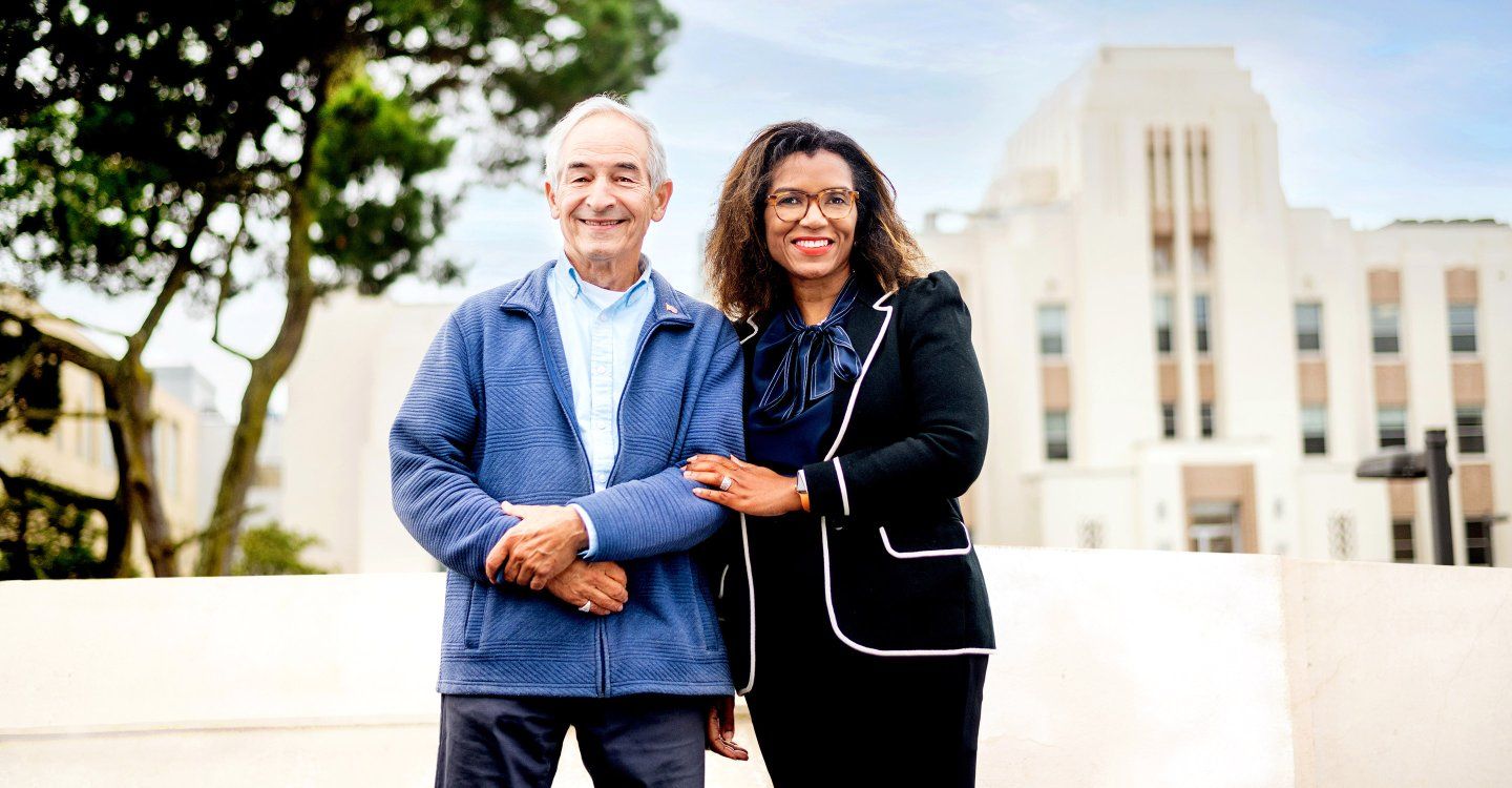 Patient Rich Rusdorf and Marjorie Charles, PhD, stand outside the San Francisco Veterans Affairs Medical Center 