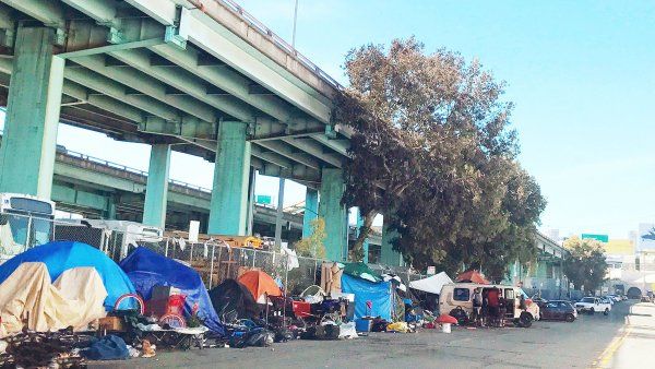 homeless encampment lining a San Francisco street