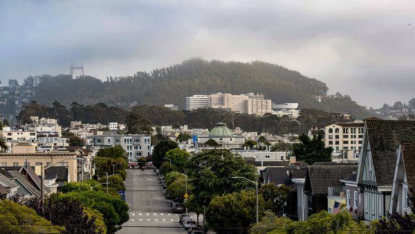 The UCSF Parnassus campus seen from far away on a partly cloudy day