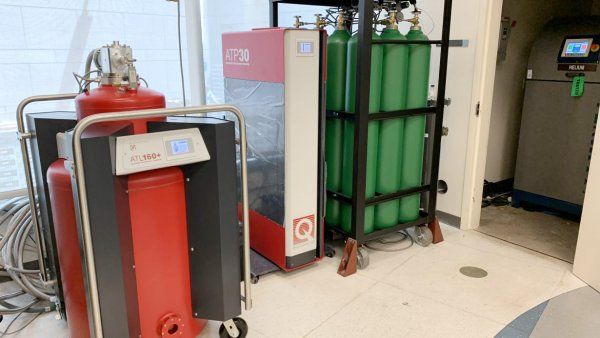 machines that recycle helium and tanks to hold the gas