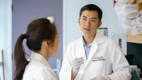 Tien Peng, MD, assistant professor in Medicine and recipient of the NIH New Innovator Award, and Rebecca Moon, a research associate, study the regenerative proportions of mesenchymal cells (or stem cells) and their relationship to aging, in his lab on the Parnassus campus.