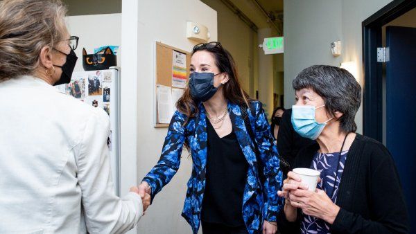Ashley Biden, MSW, shakes hands with Mary Burke, (left) MD, Professor, UCSF Psychiatry, and is accompanied by Alicia Boccellari, (right) UCSF TRC Director of Special Programs and NATRC Executive Director.
