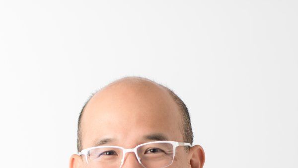 Photograph of C. Benjamin Ma against a white background