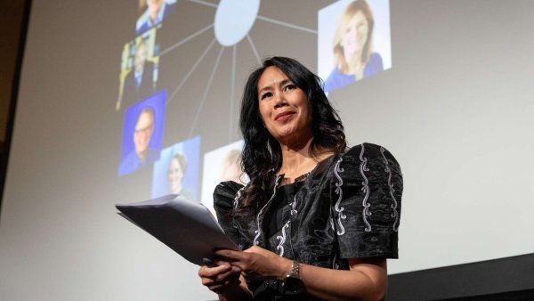 Dr. Jennifer Cocohoba speaking at a podium during the 2026 Last Lecture at UCSF.
