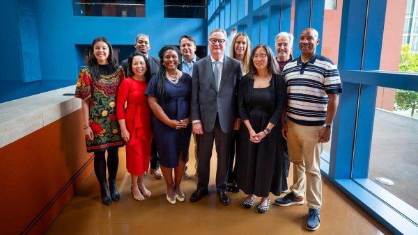 U C S F Chancellor Hawgood poses for a photo with the 9 recipients of the 2026 Chancellor Distinguished Service Awards.