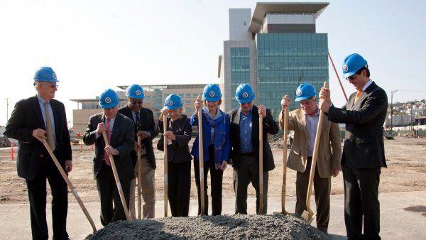 Breaking the ground on the construction site of Global Health and Clinical Sciences Building