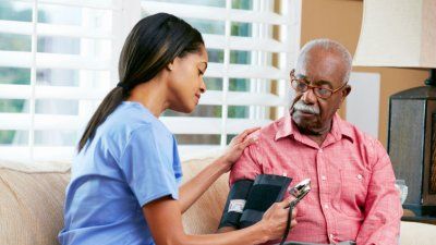 nurse-blood-pressure-hypertension-elderly-black-man.jpg