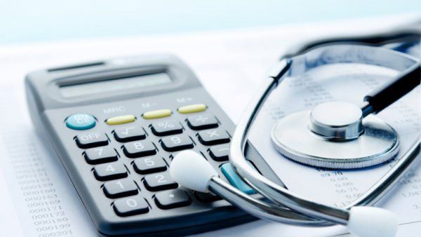 calculator-stethescope-hospital-bill-costs.jpg