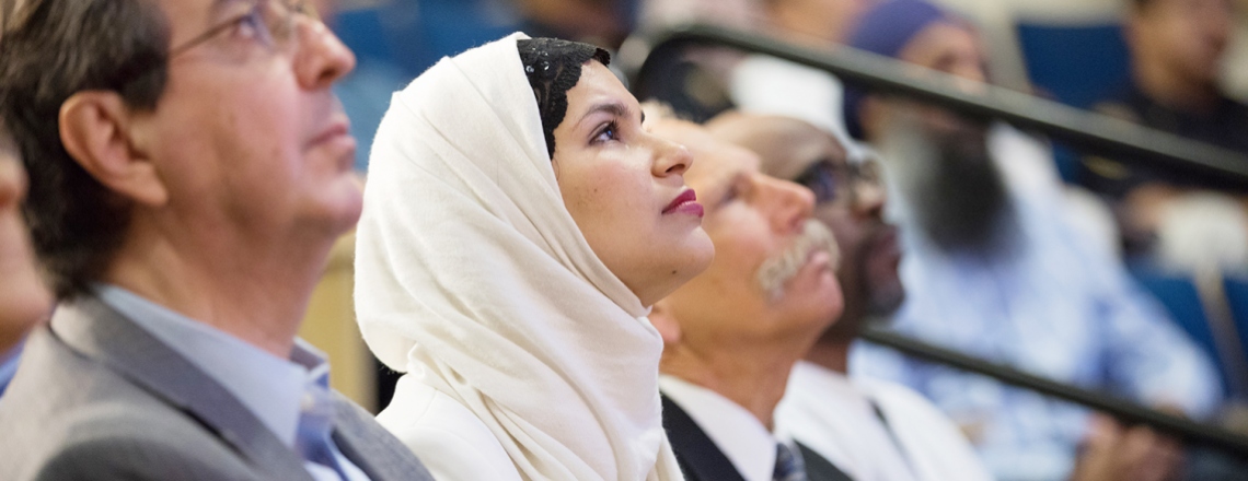 Engie Salama watches a video during the Chancellor’s Leadership Forum on Diversity and Inclusion