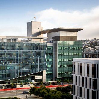 The facade of the Bakar Precision Cancer Medicine Building from Mission Hall