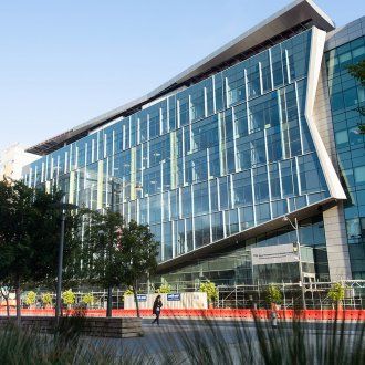 The dramatic angled facade of the Bakar Precision Cancer Medicine Building