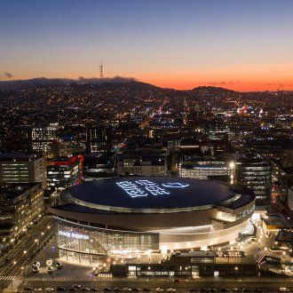 The Chase Center from overhead during sunset