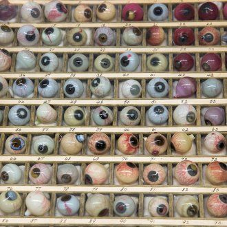 Rows of glass eyeballs historically used for medical instruction