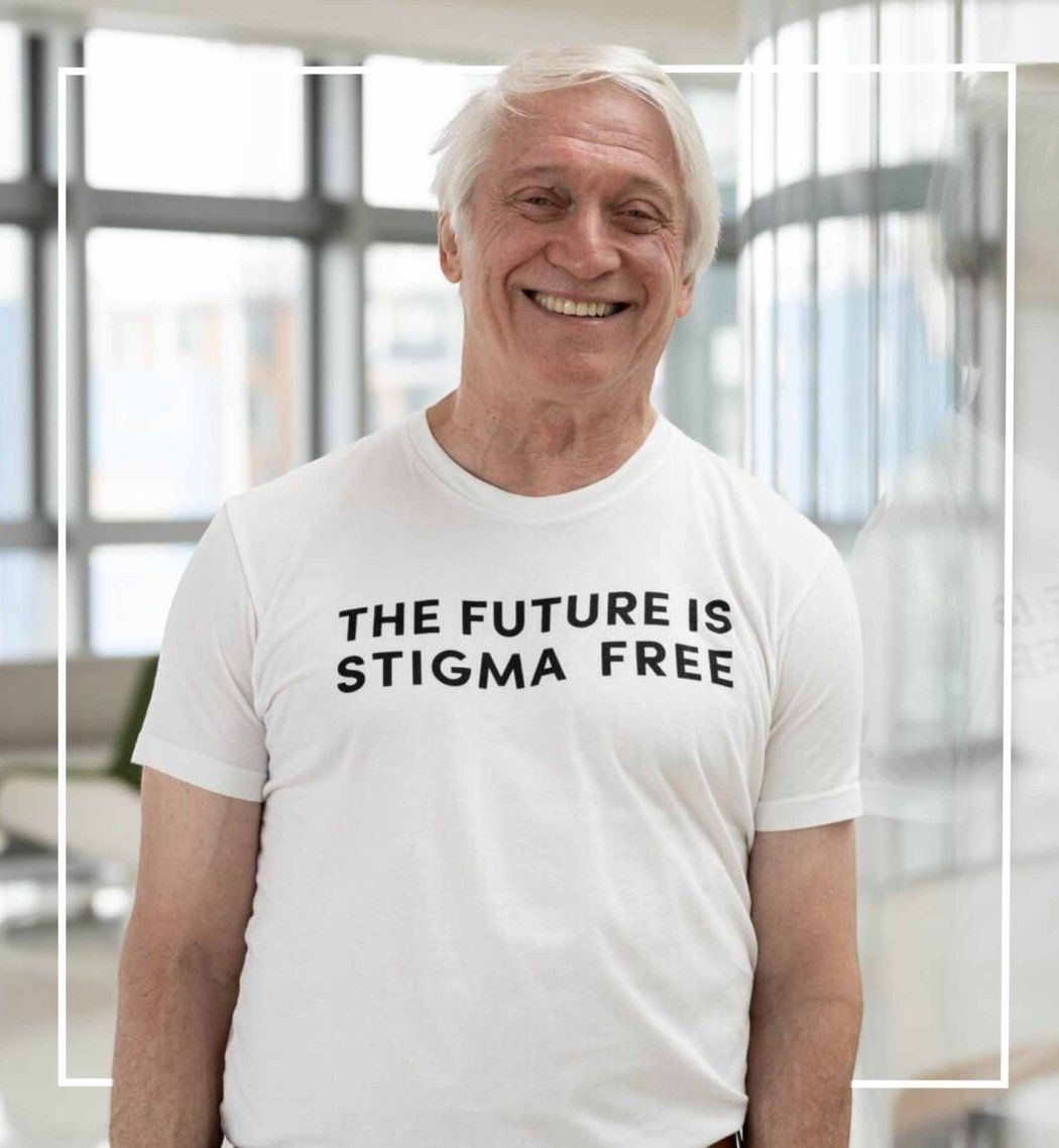 Stephen Hinshaw wears a shirt that says "The Future is Stigma Free"