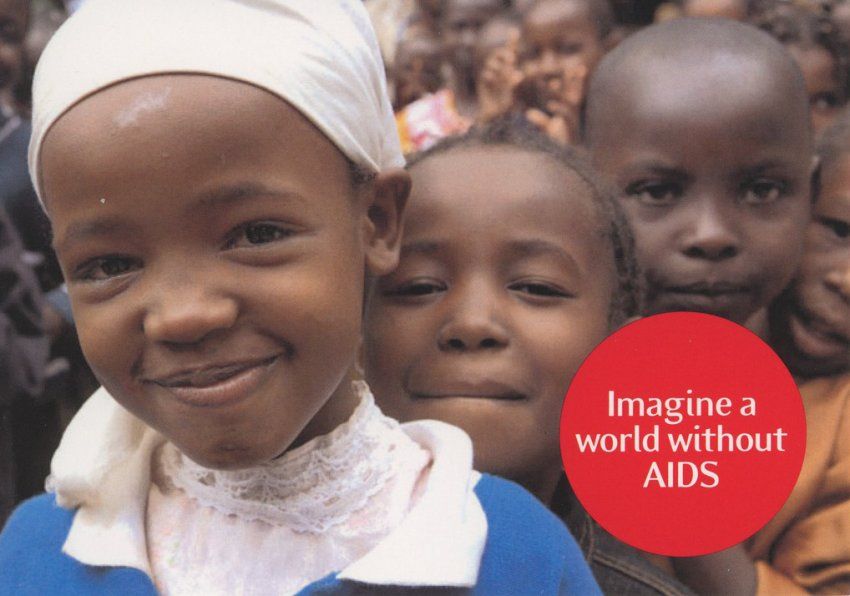 A postcard showing the faces of children with the words Imagine a World with No AIDS
