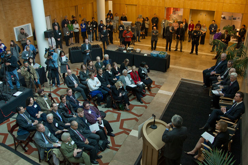 Faculty, staff, students, supporters and others gathered in the Genentech Hall Atrium for a special event to recognize the success of the city’s bioscience hub at Mission Bay, 10 years after it opened its first research building.